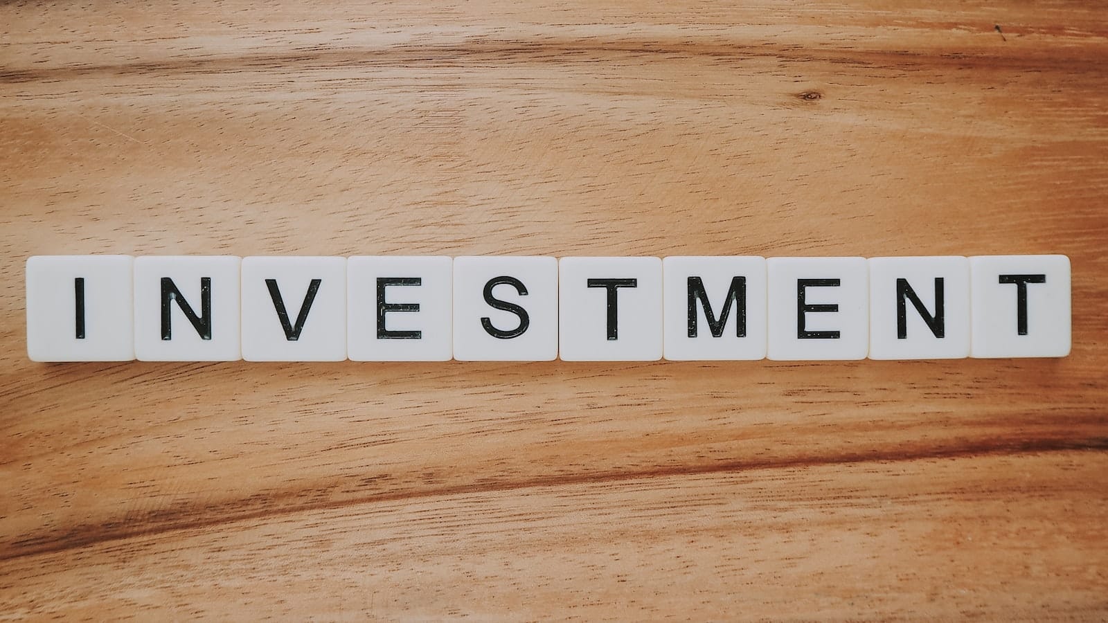 Investitionen Scrabble-Text
